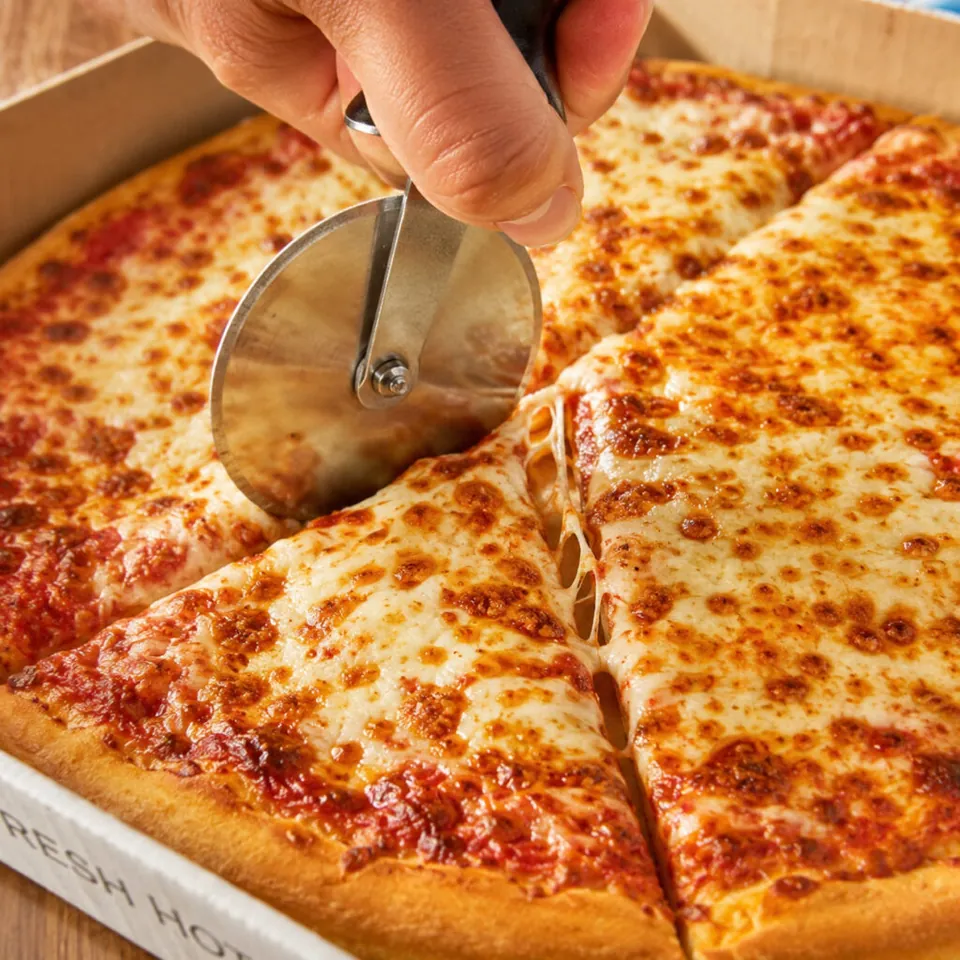 Cheese pizza cut into slices